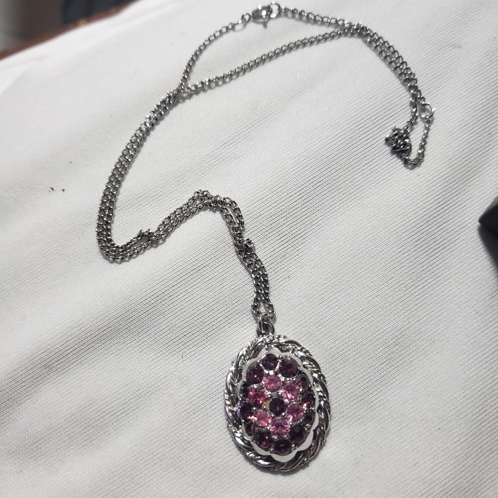 Vintage not sure of what the stones are. Stainless stell dubble sided necklace